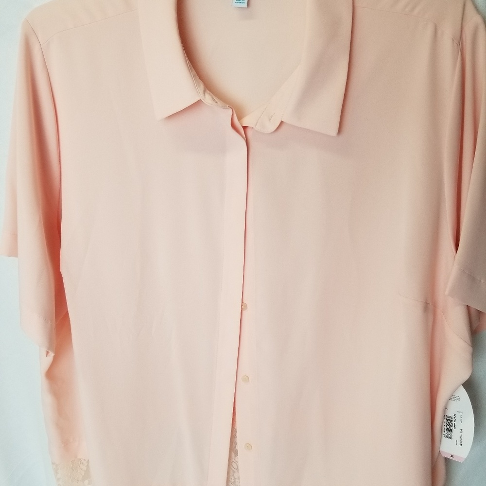 Button front, peach colored short sleeved blouse.